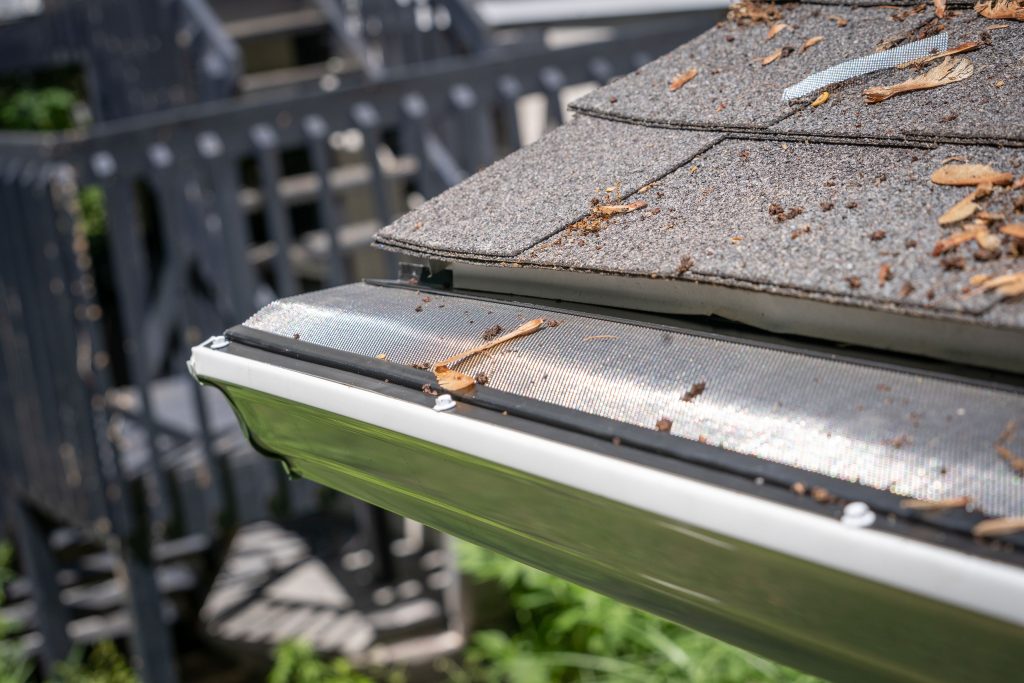 gutter guards keeping leaves from entering gutter