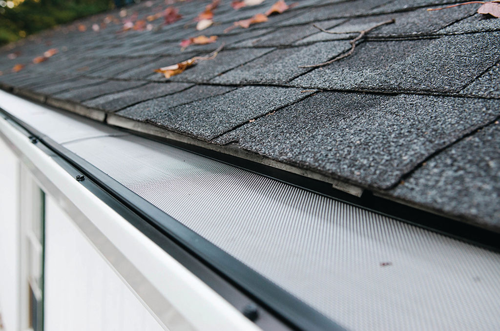 gutter services - mesh gutter guard on gutter