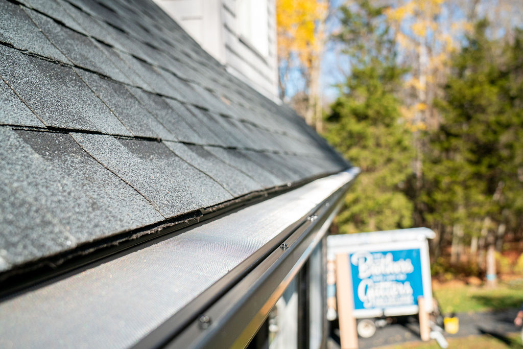 mesh gutter guards with Brothers Gutters truck in background