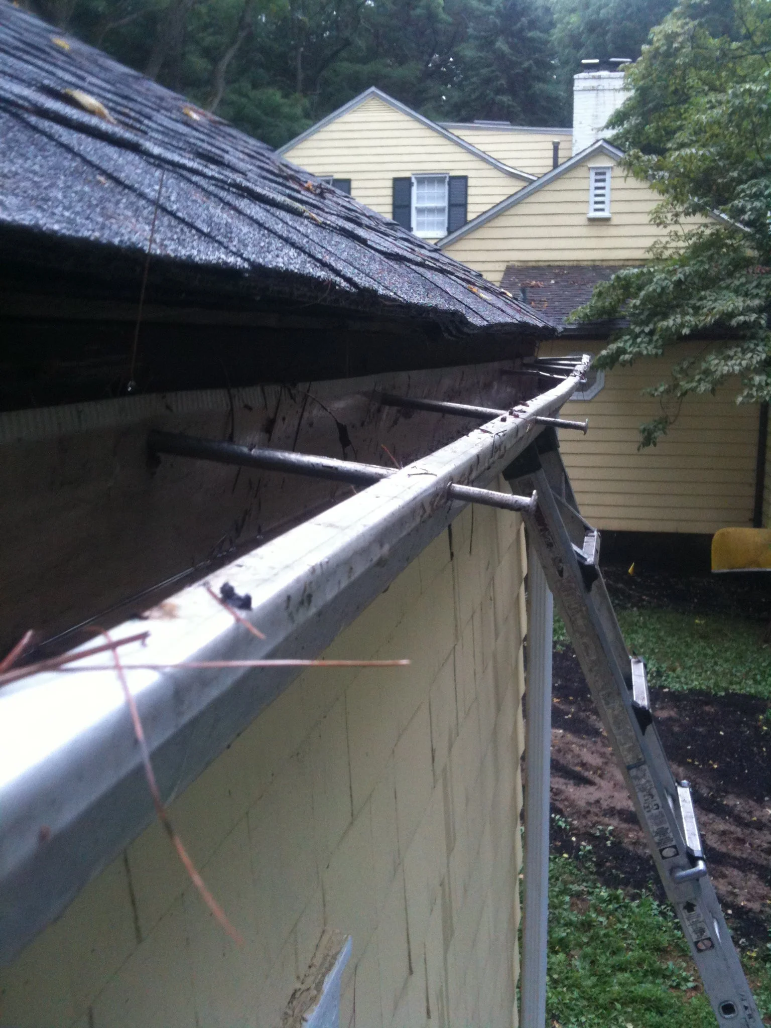 New seamless gutter run installed on a Northwest Arkansas home