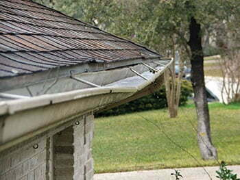 Gutter repair work on a Northwest Arkansas home